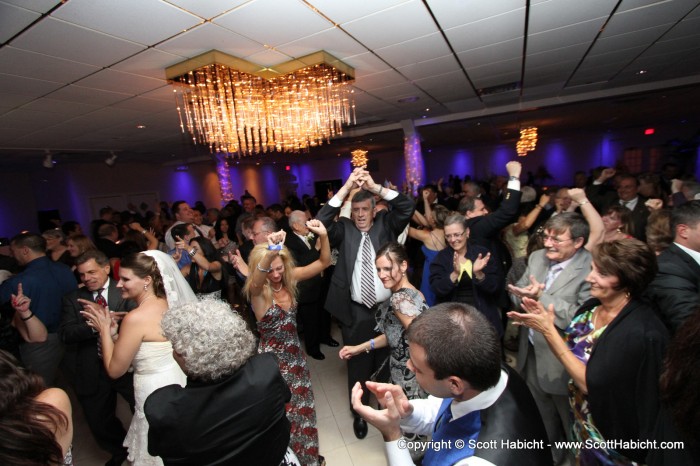 As the room erupted into a frenzy of dancing...