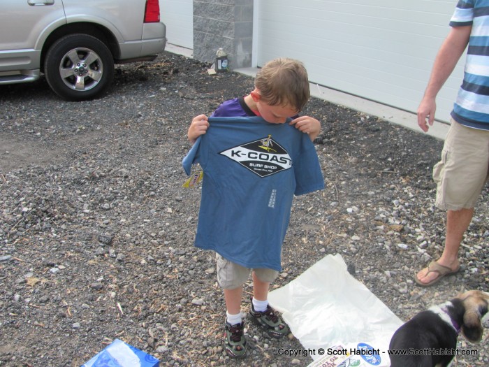 I also bought him a shirt from the surf shop where I bought his skateboard.