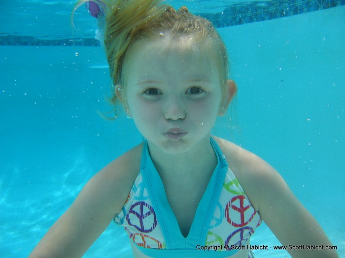 Of course, this was the "busted" picture as she was not supposed to open her eyes underwater.