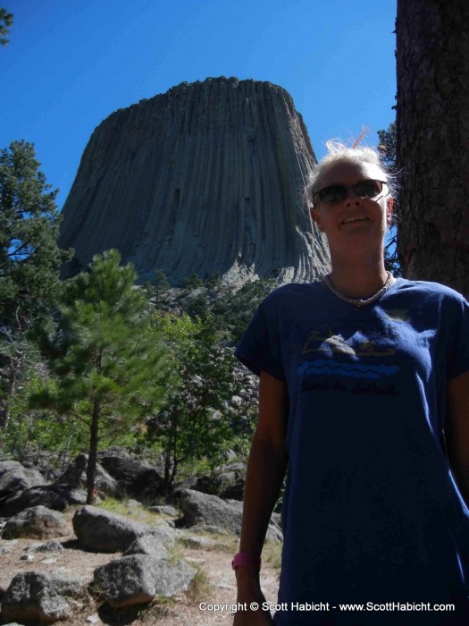 Posing with Devil's Tower in Wyoming.