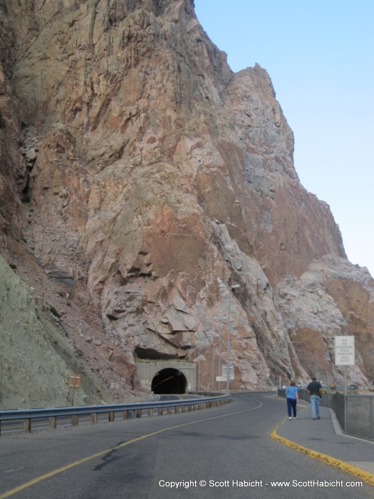 The inside of the tunnel is carved out in stone.