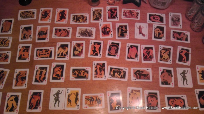 A NSFW deck of cards showing lots of sex poses.