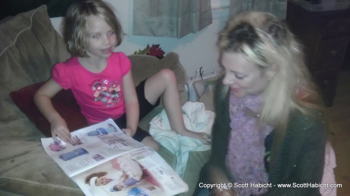 Amber and Kel review the American Doll catalog.