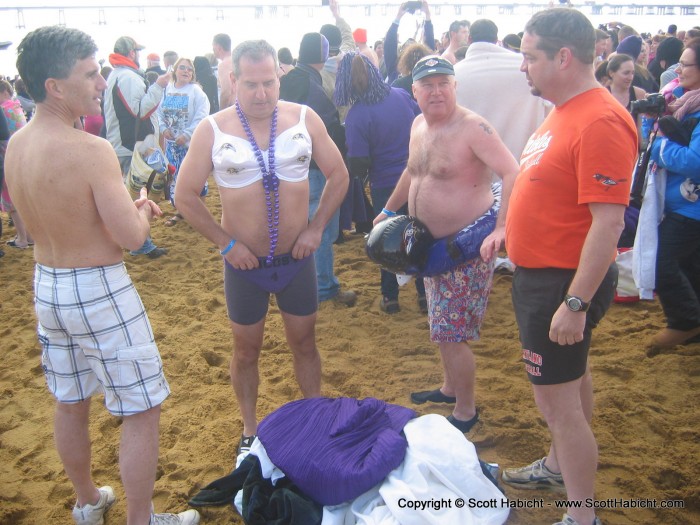 A last minute check before heading into the water.