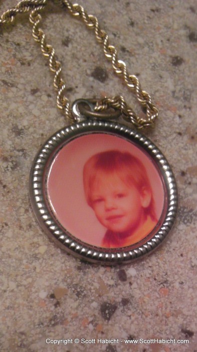 An old photo of Kelli on a necklace Ashley sometimes wears.