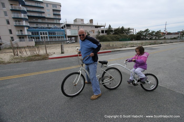 How Tom is teaching Ava to ride a bike.