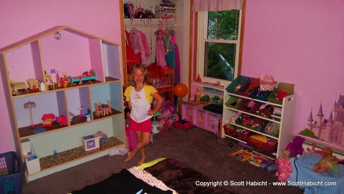 Pink is the color of her room.