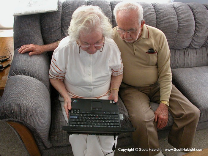 Showing some pictures to my grandparents. My grandfather is just mystified by computers.