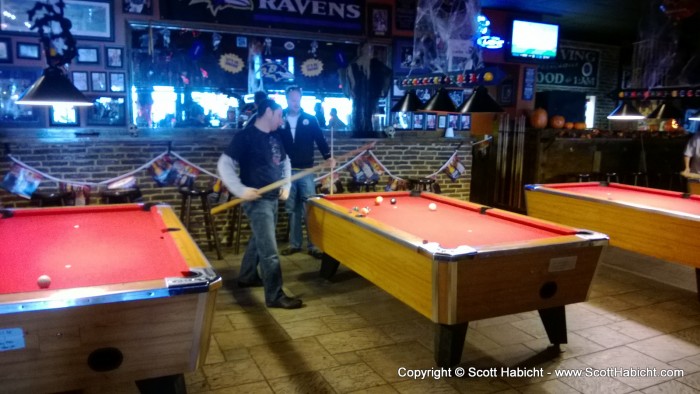 While waiting for the food, they shot some pool.