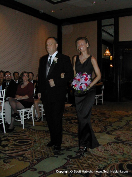 Who is this beautiful woman helping to lead the procession?