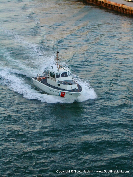 A Coast Guard escort on the way out of Miami.