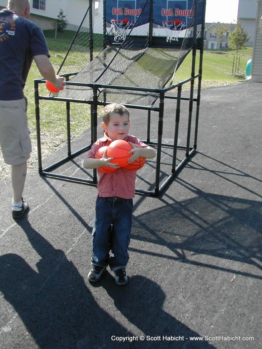 This little kid was not only hogging the balls, he was more the happy to state, "I have three balls!!"