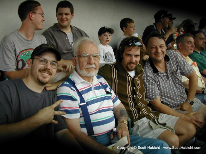 Matt and I took our father and grandfather to the O's vs Yankees game for Fathers Day. (Matt is indicating the number of people he's with)