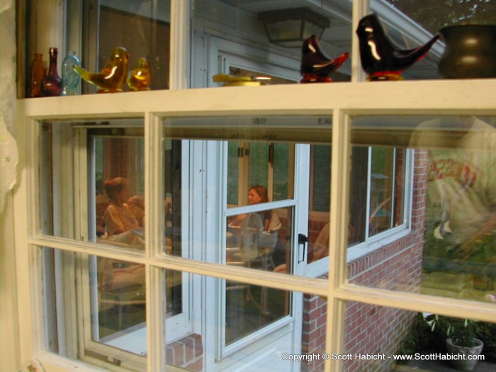 Kelli and her mother reflect on life, while Mike reflects on the window.