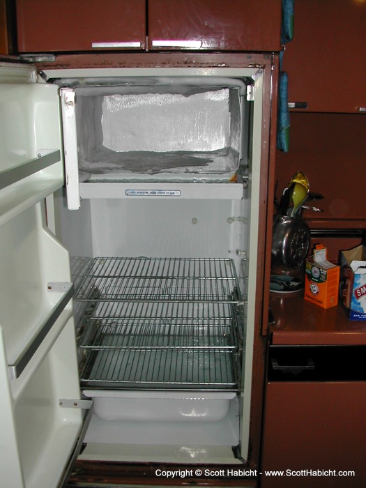 I thought this would be a good time to defrost the fridge, but we needed a place to put the beer so.......