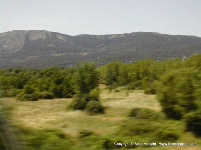 On the train watching the landscape go by.