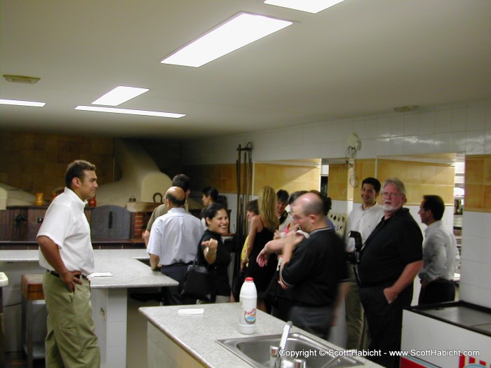 Everyone looking at the ovens.