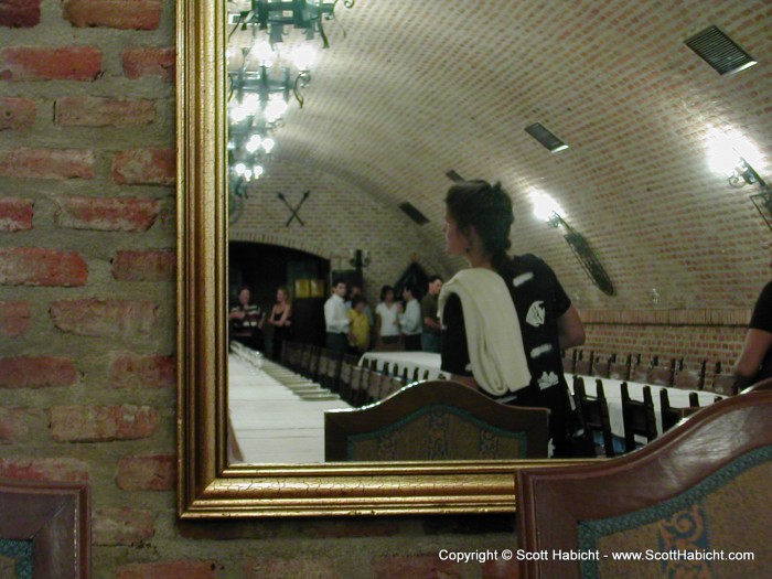 Looking into a mirror back into the banquet room.