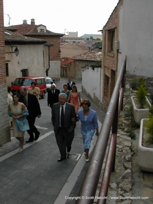 Walking through the narrow streets leading to the wedding.