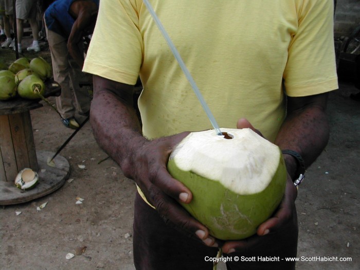 On the way back to town, a stop for some coconut water and conversation with the locals.