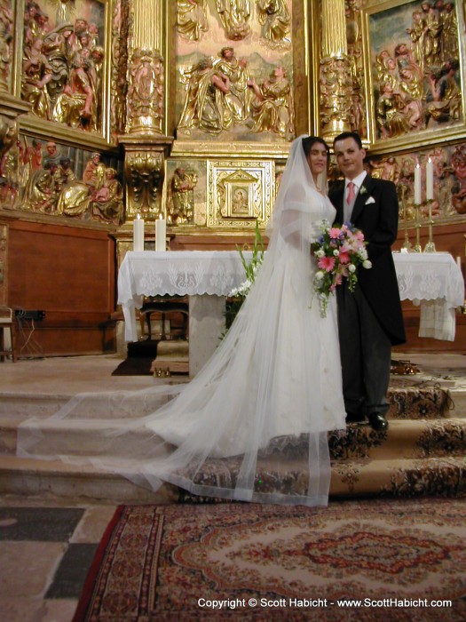 A shot of the couple with the whole dress.