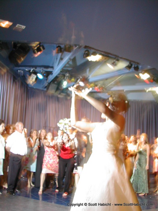 Tossing of the bouquet. The camera moved, but I like the way this turned out.