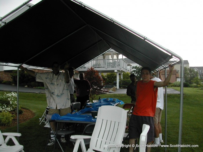 True story, it was a lightning storm and we had to hold the metal tent to keep it from flying away.