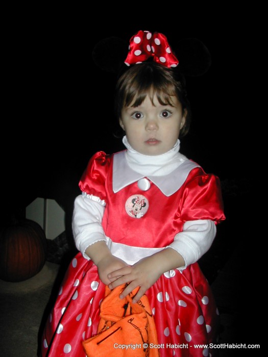 See what I mean...She has no idea what is going on, but she's happy to get the candy.