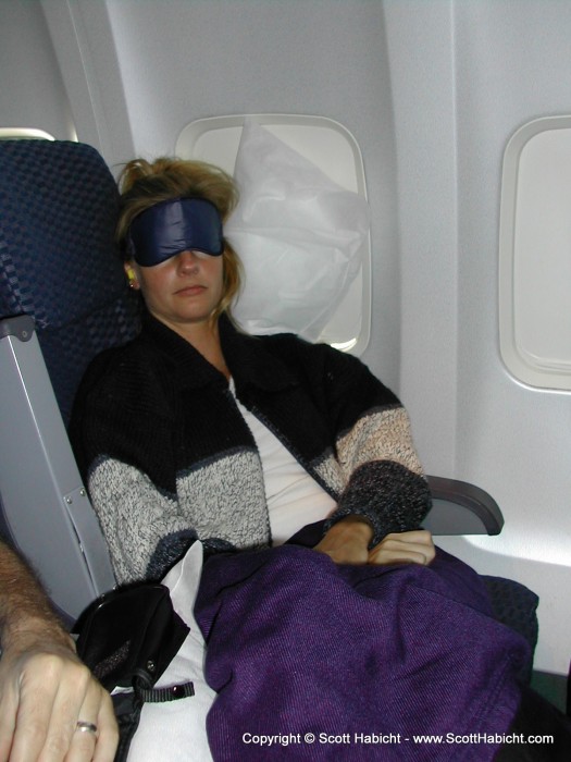 The flight was too long, so Kelli napped.