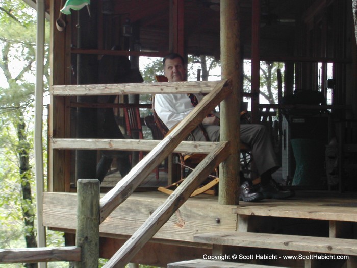 Rachel's father sitting on the front porch waiting to see what comes next....