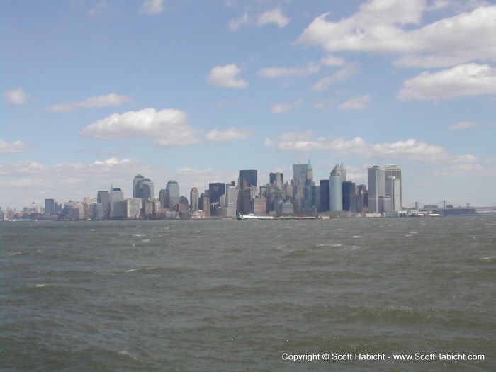 Looking back from the statue to NYC.