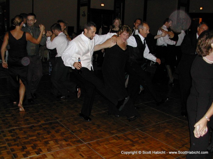 In this dance, as Darin and his parents demonstrate, you do the Rockettes thing.