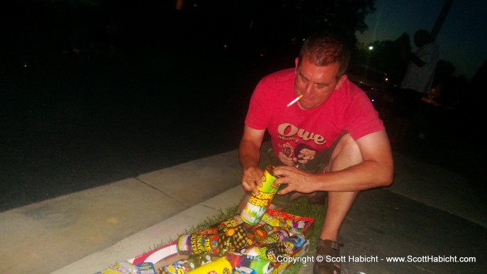 Peter showing how to be safe by playing with fireworks while smoking.