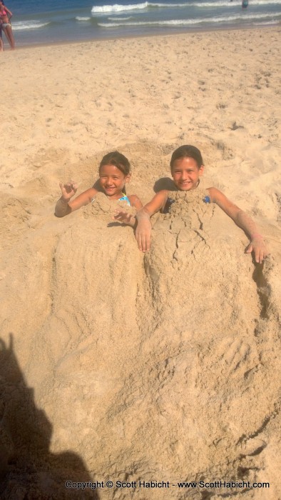 ...kids love to be buried in the sand.