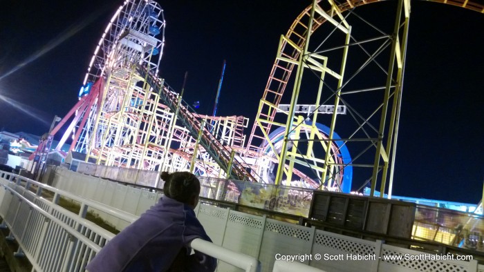 And on the way back she watched the roller coaster go through the loop.