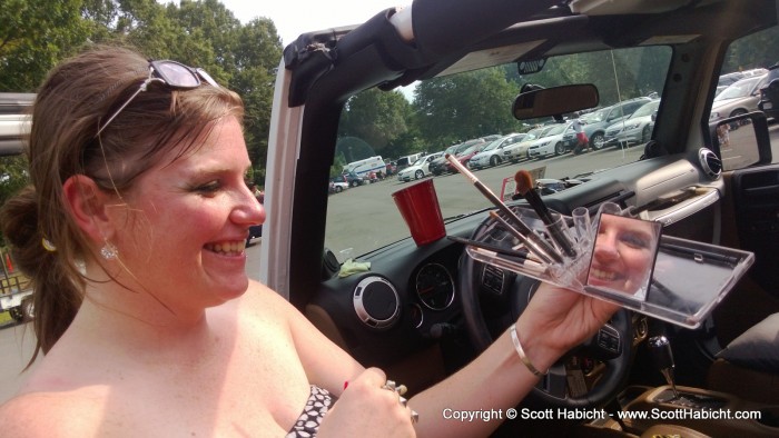 I went for a walk around the parking lot and found this lovely lady doing her eye makeup.