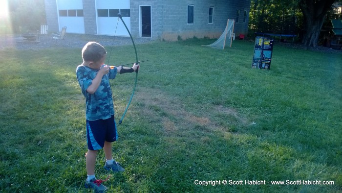 Taylor also tried out the archery set.