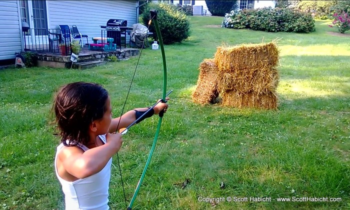 Ashley working on her archery skills.