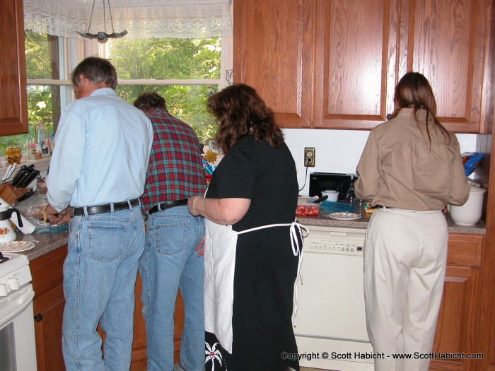 My mother being a good mom on Mother's Day by attending to her children.