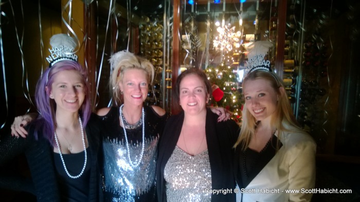 The Melting Pot hostesses kick off New Year's Eve with their annual photo.