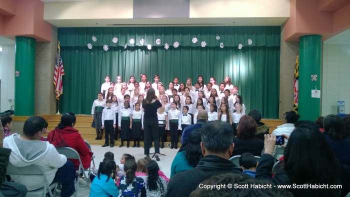 Ashley singing at a school concert.