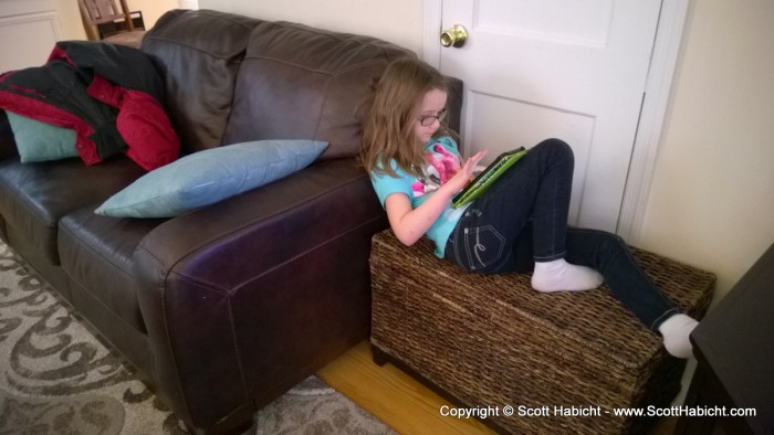 Back at Peter and Megan's, and Jillian has found a comfortable spot to sit.