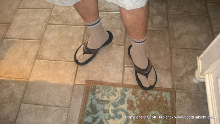 How my neighbor Tom wears his flip flops. DORK!!