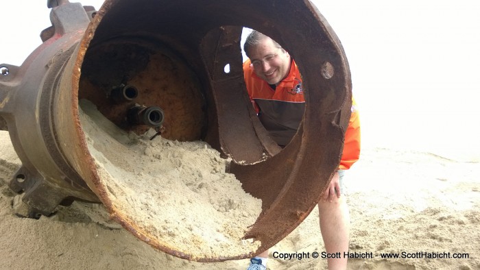 And a slurry mix of sand and water is pumped from the barge to the beach.