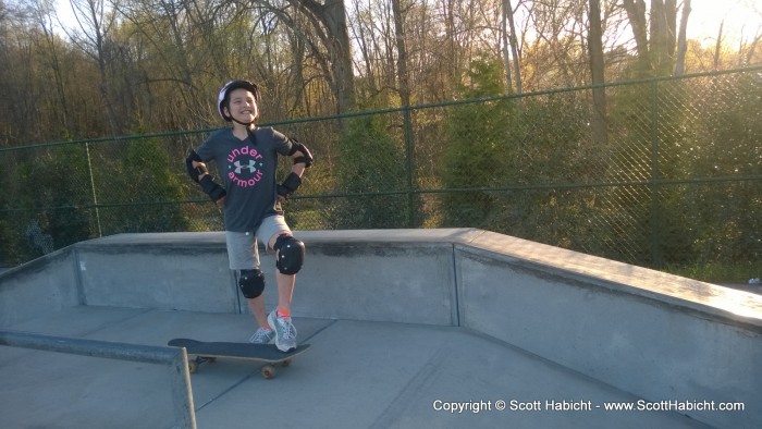 Teaching Ashley how to skateboard.