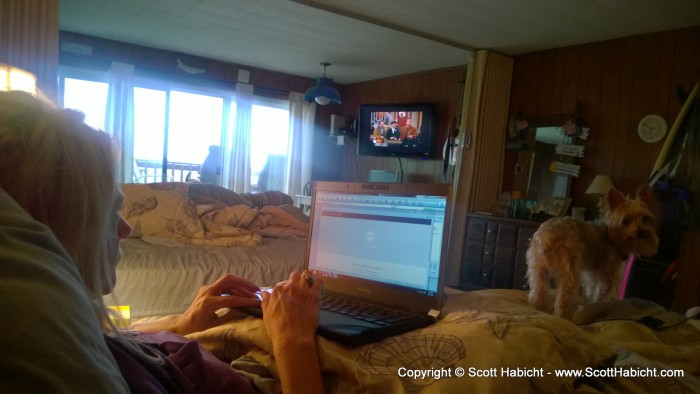 Kelli couldn't be happier with her TV and laptop on a rainy day.