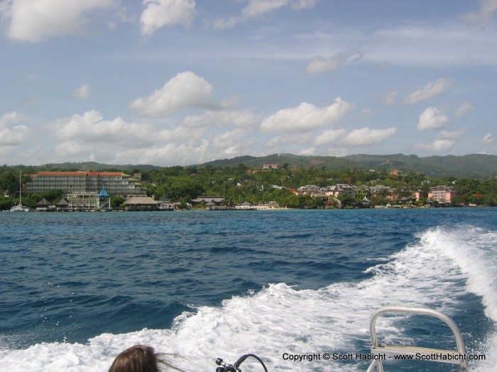 Back on the dive boat, and this is what the resort looks like from the water. The two orange roofs at the top center is where the running picture from earlier in the trip was taken.