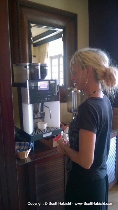 In the butler suite in the main building, Kelli made herself a cup of coffee...