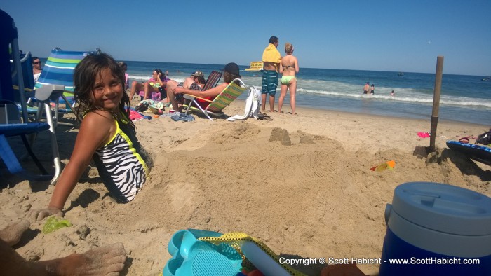 What kid doesn't like being buried in the sand at the beach.