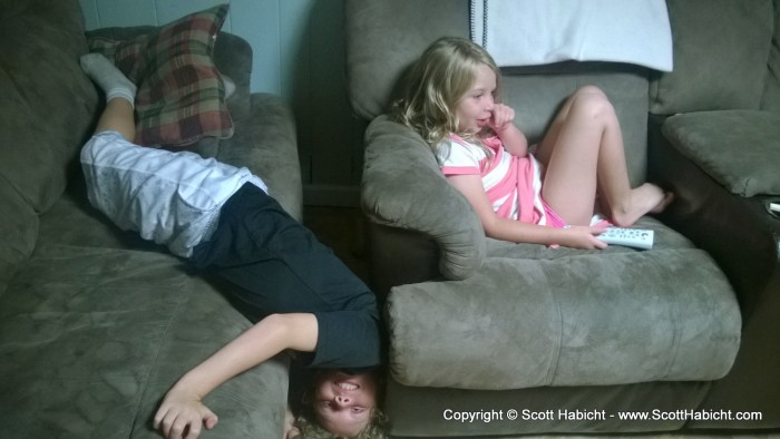 What the kids think is a comfortable way to watch TV.